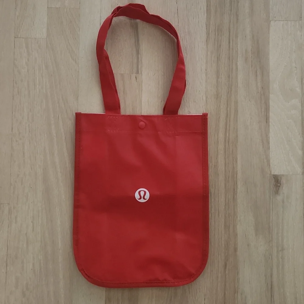 Lululemon Athletica Red Small Tote Bag With Fabric Straps And Snap Closure